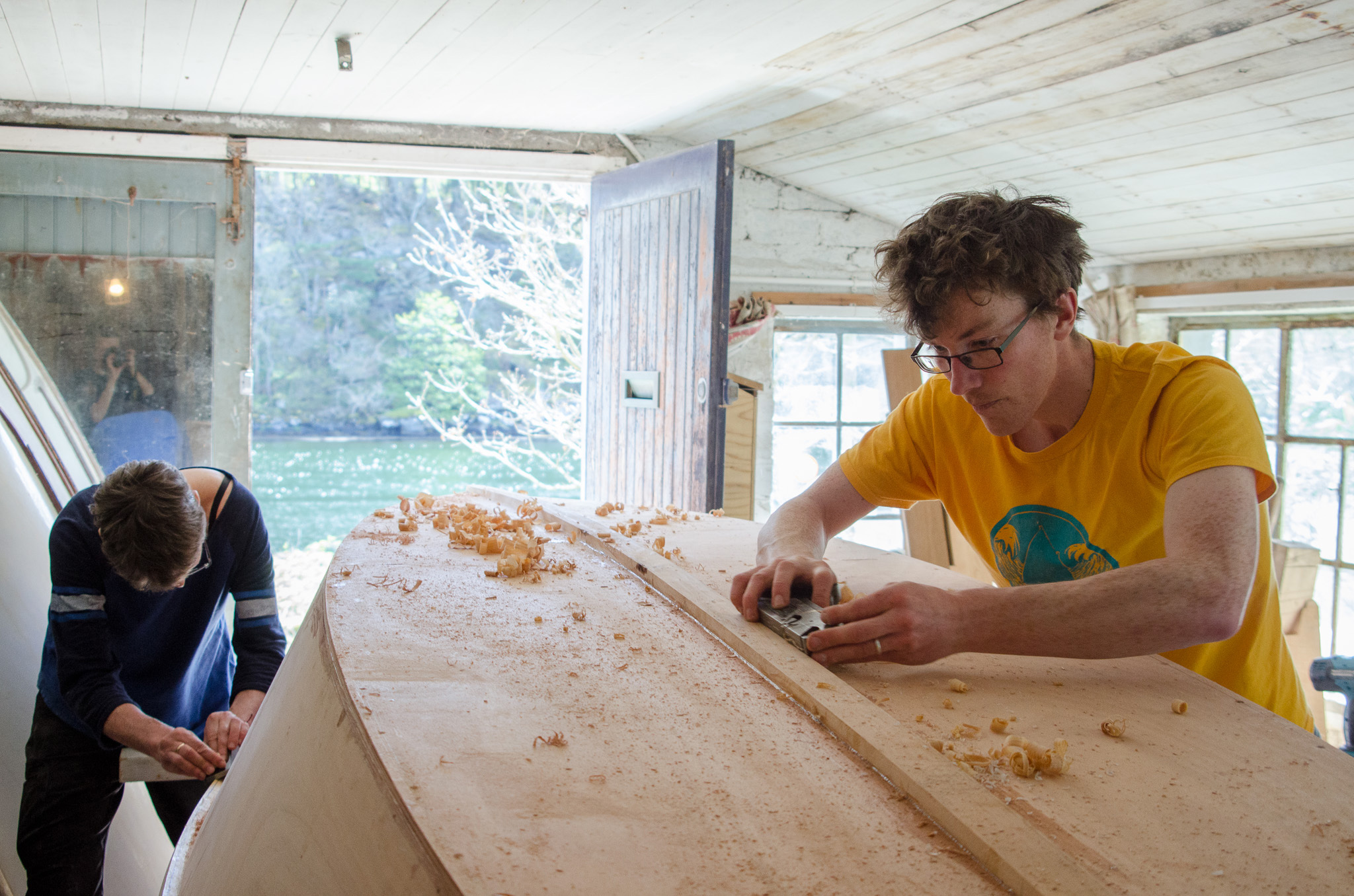 boatbuilders working on the boat