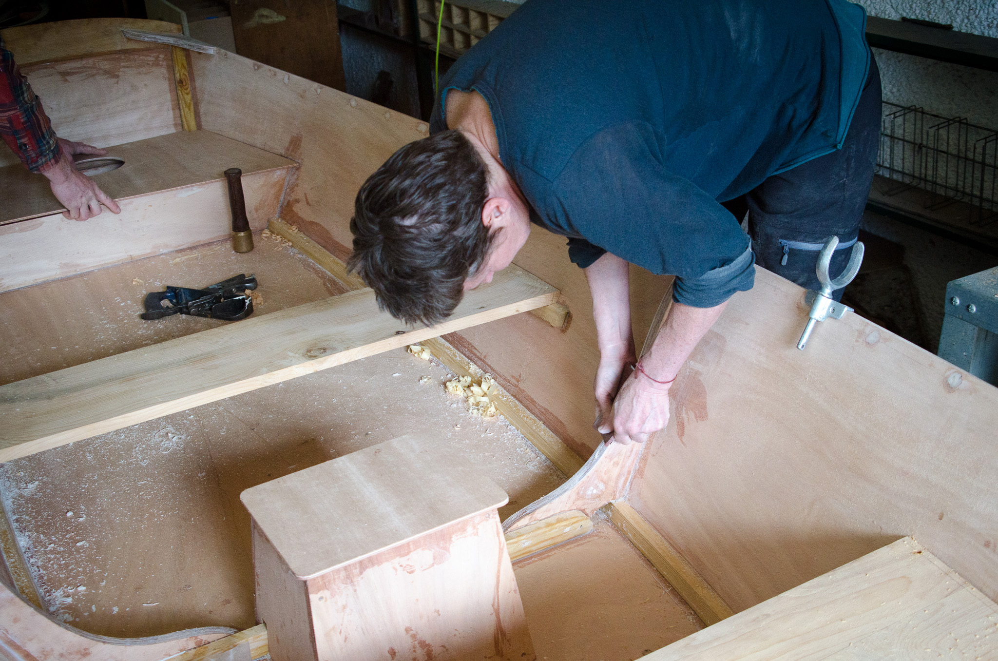 boatbuilders working on the boat